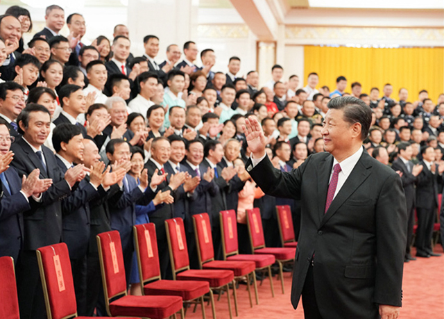 習(xí)總書記親切會見慶?；顒踊I辦工作各方面代表